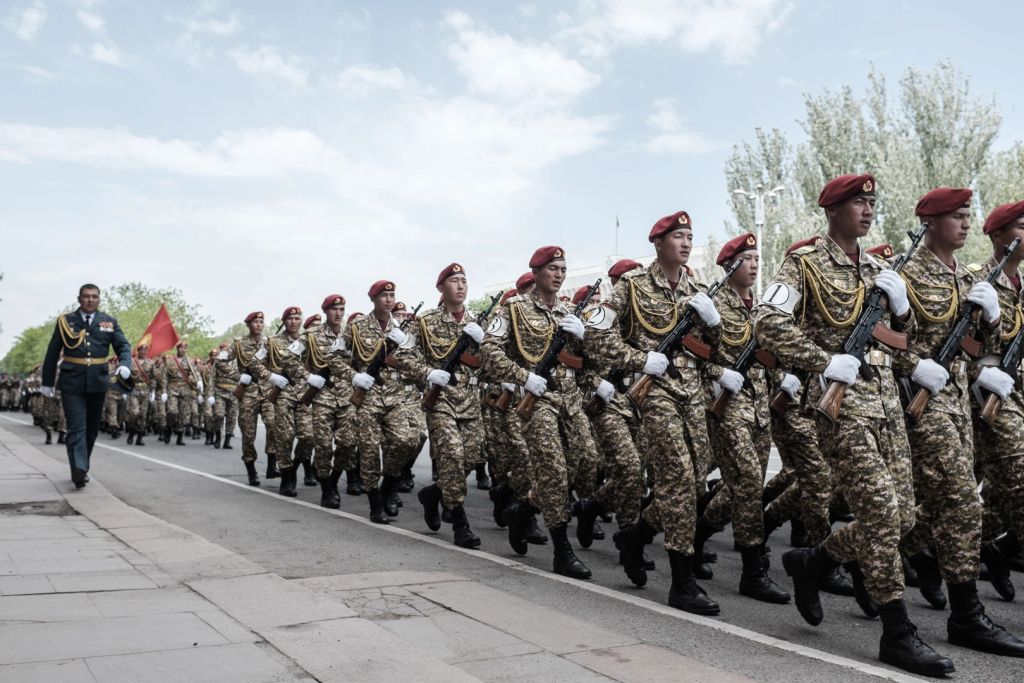Kyrgyz and Russian troops march in unison around the city's main square in preparation for the main parade two days later.